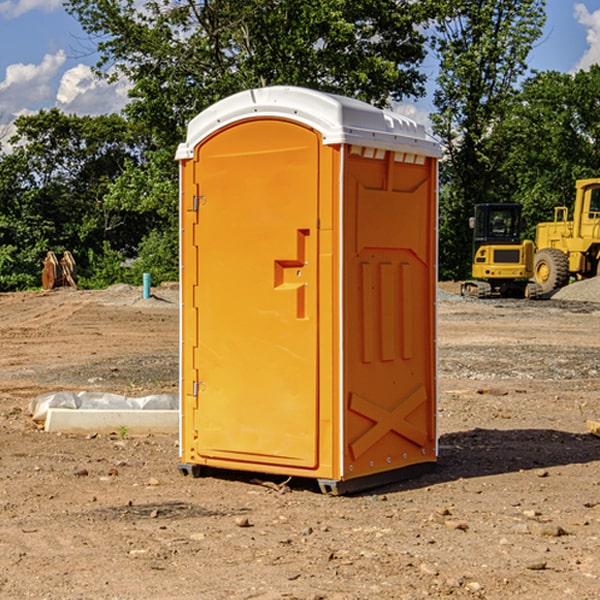 what is the cost difference between standard and deluxe portable restroom rentals in Ramer